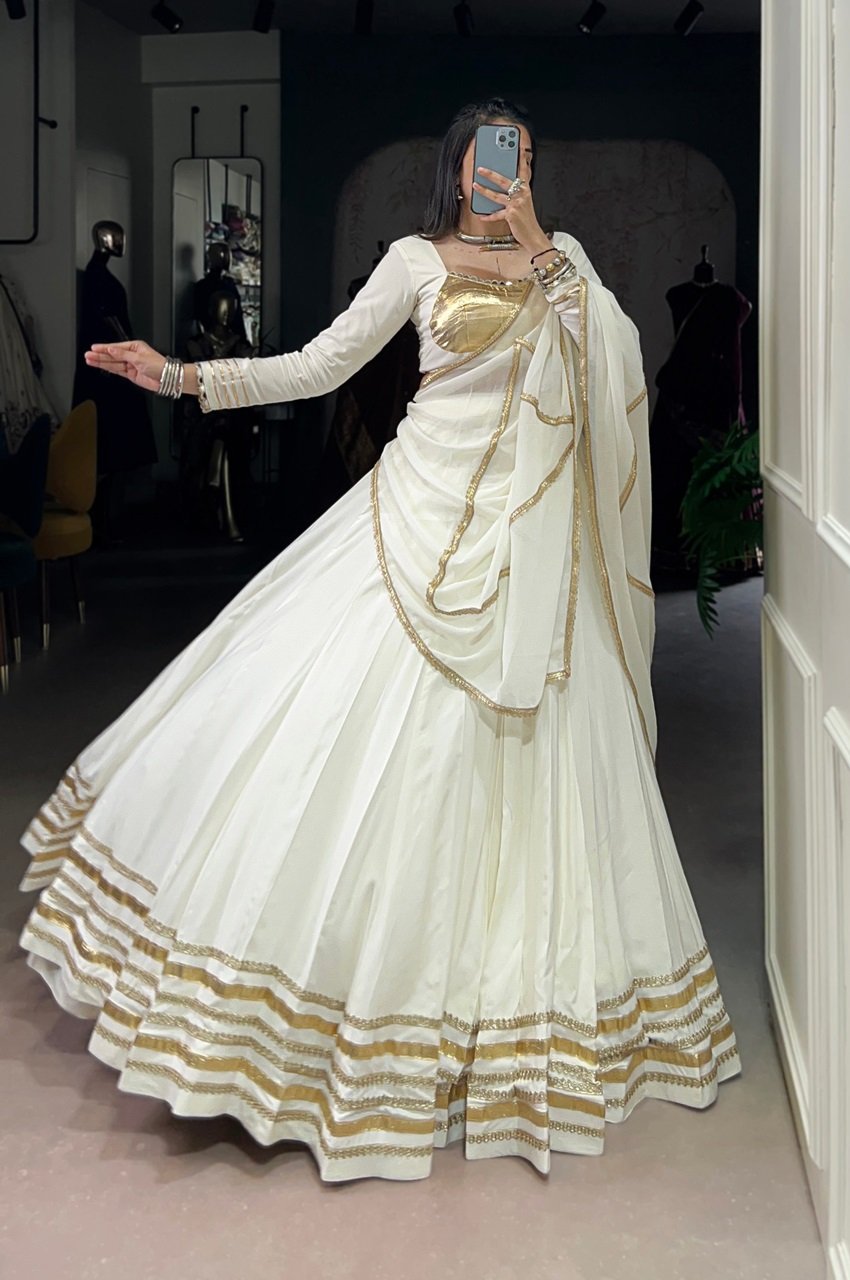 White Navratri Lehenga Choli by DhingliMatching
